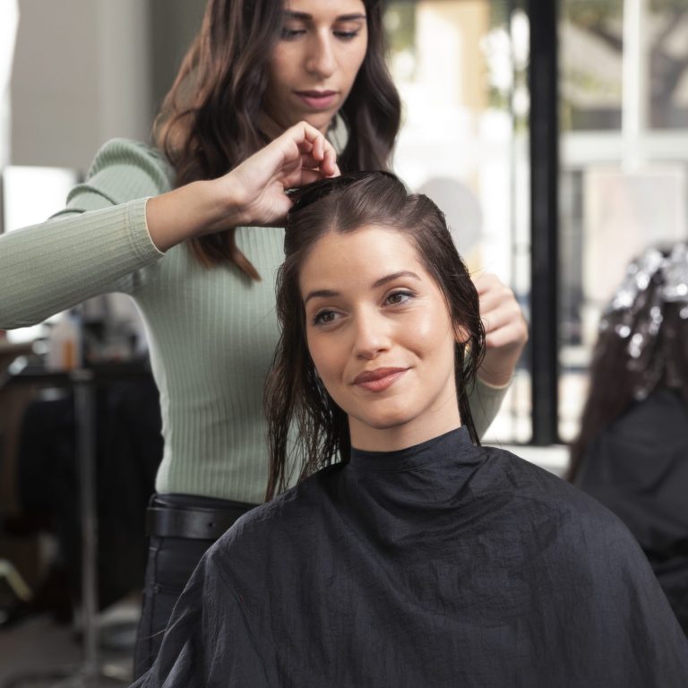 woman-getting-treatment-hairdresser-shop-scaled